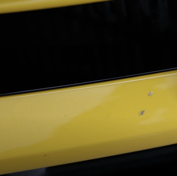 Blemishes in paint protection film from rocks.